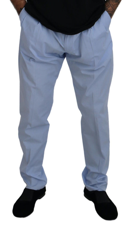 Man wearing blue pants and black shoes