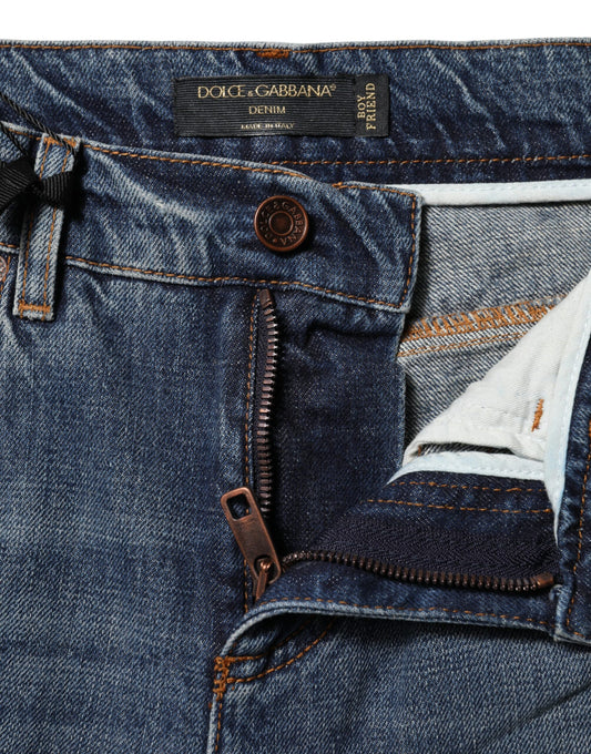 Blue denim jeans with zipper fly and button closure