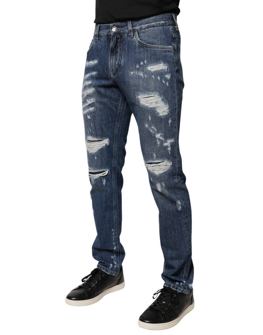 Man wearing blue jeans with holes and rips