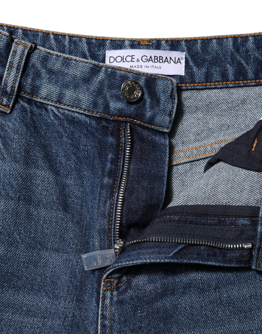 Blue denim jeans with zippered front pocket