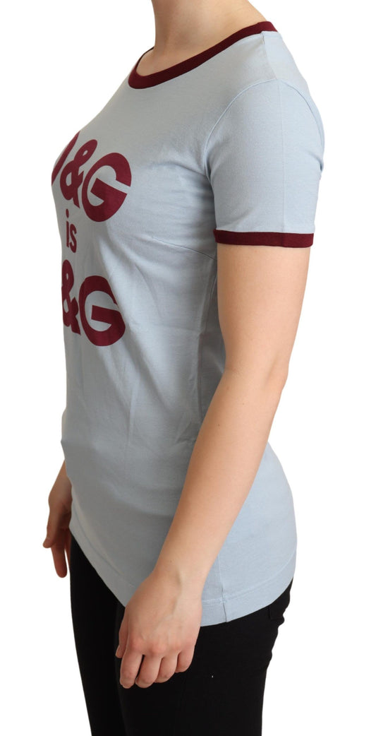 Woman wearing gray t-shirt with red lettering