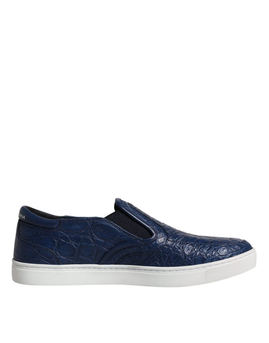 Blue slip on shoe with white sole and laces