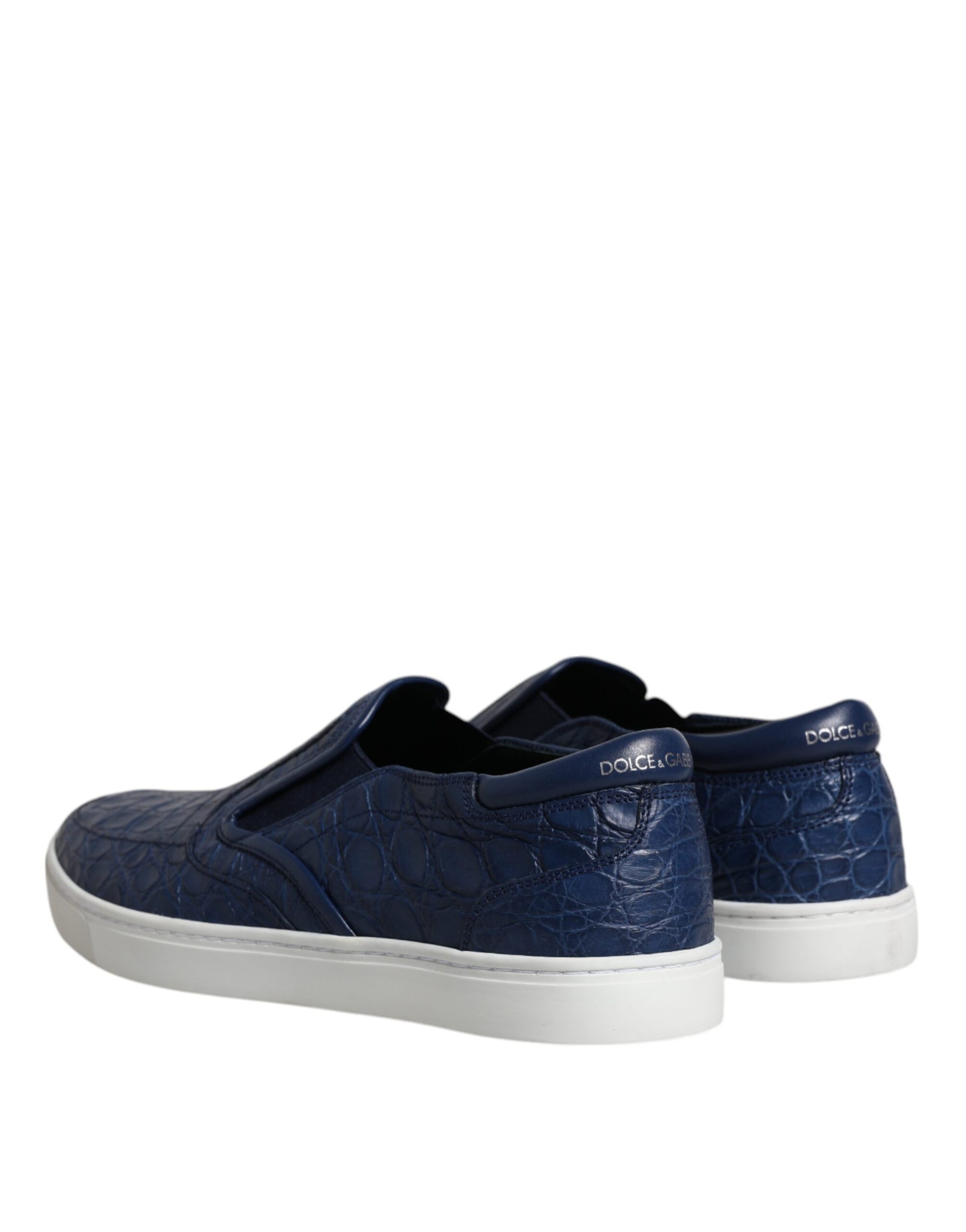 Pair of blue sneakers with white soles and laces