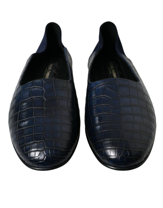 Pair of blue loafers with crocodile skin texture
