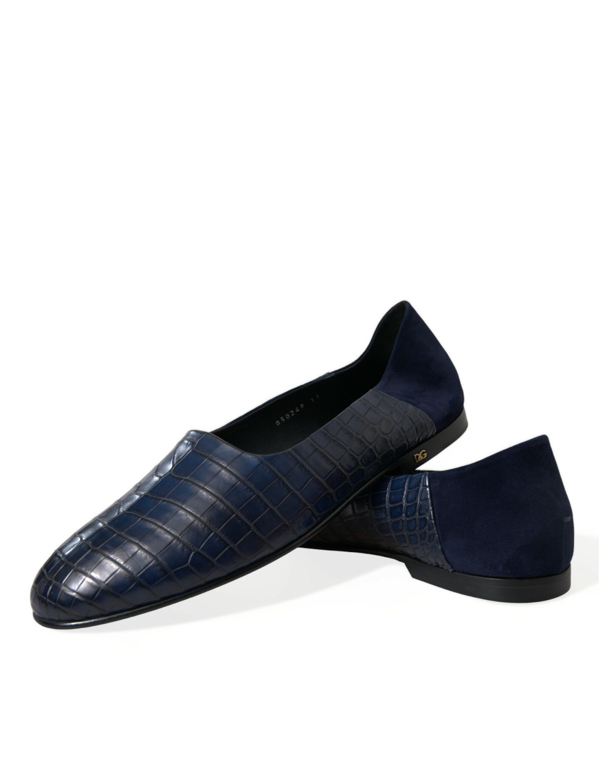 Pair of blue loafers with a crocodile skin texture design