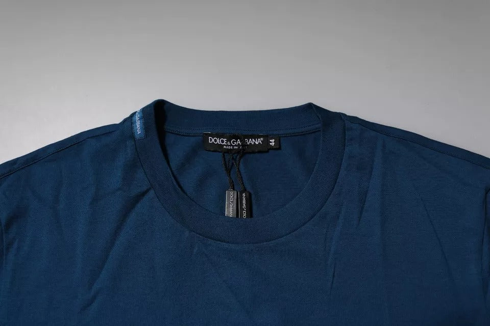 Blue t-shirt on hanger
