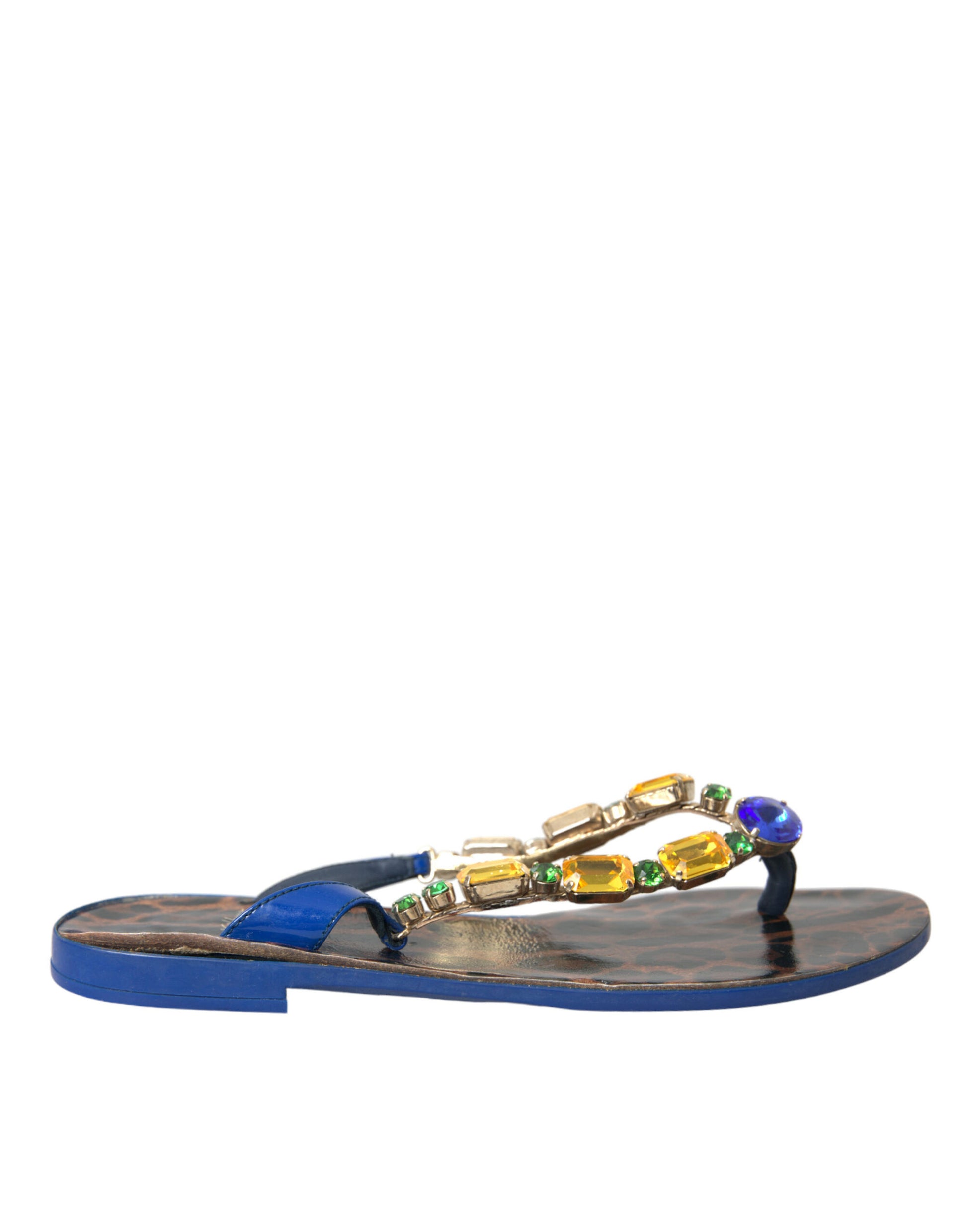 Blue sandal with jewel embellishments on footbed