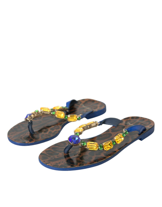 Pair of blue flip flops with colorful beads on straps