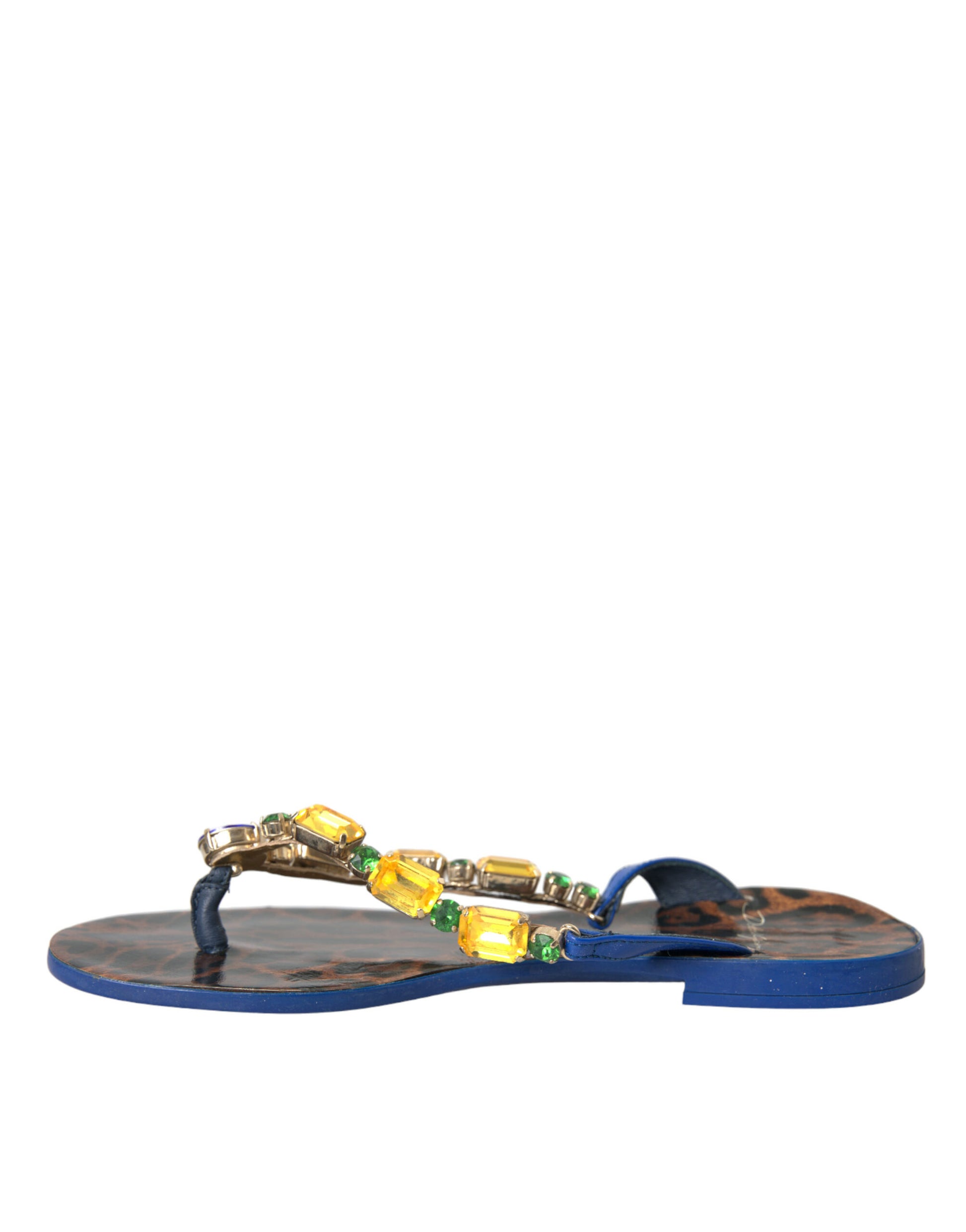 Blue flip flops with yellow jewels on straps