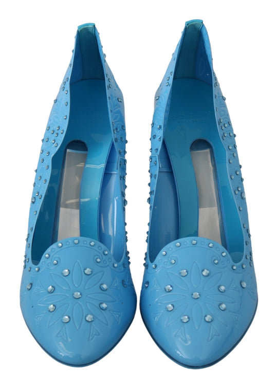 Pair of blue women's shoes with embellishments and heels