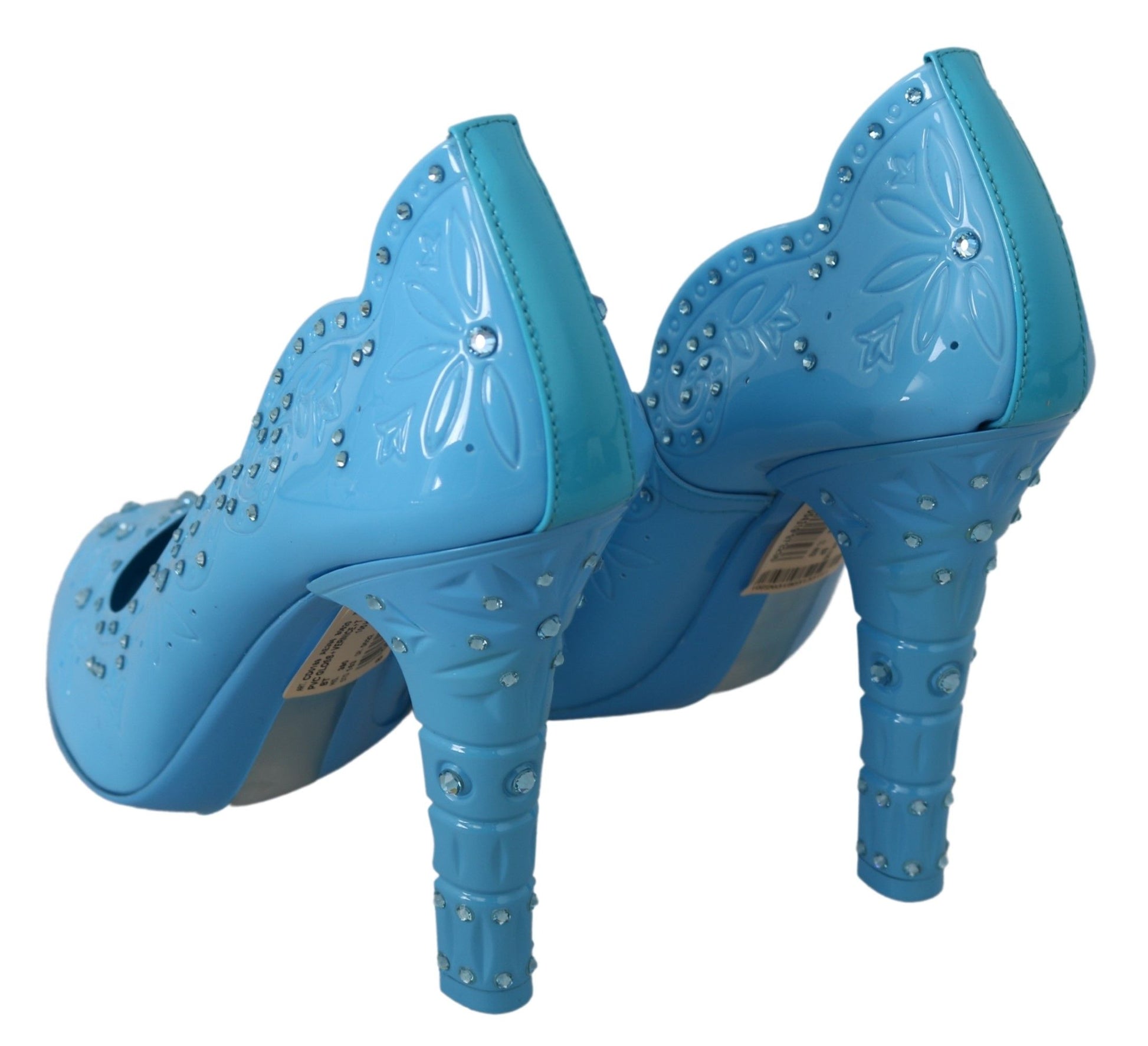 Blue high heel shoes with rhinestones and a bow on top