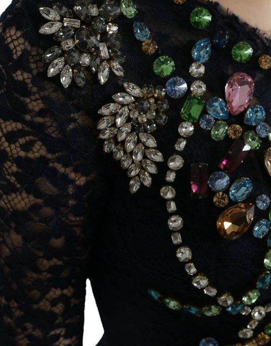 A black lace dress with a floral pattern and crystals on the bodice