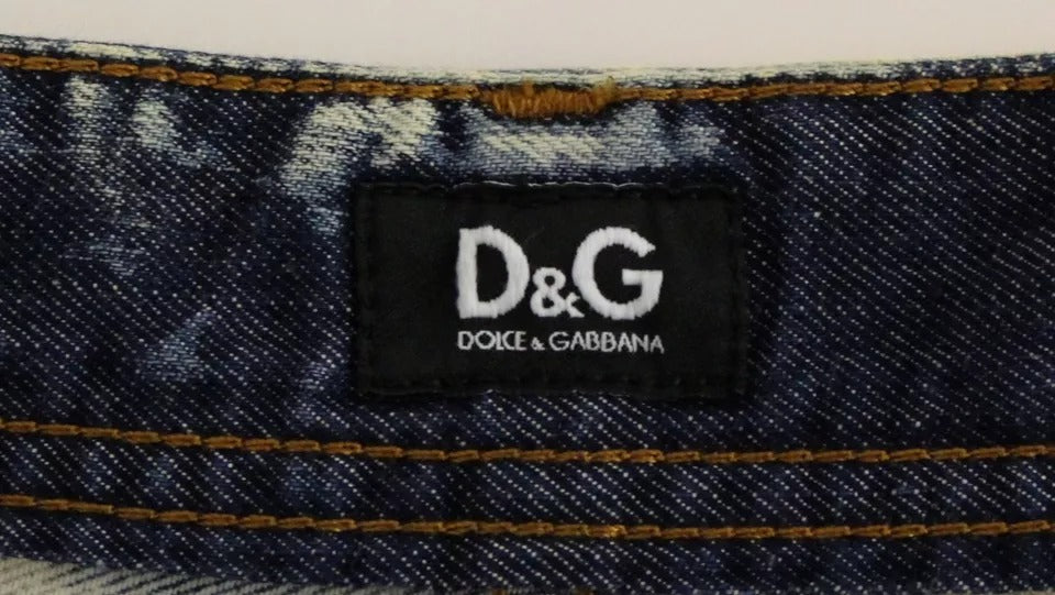 Blue denim jeans with yellow stitching on waistband
