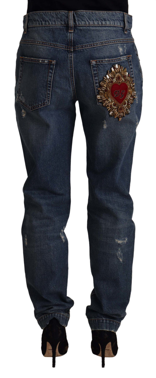 Pair of blue jeans with heart embroidery on back pocket
