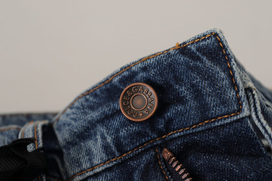 Blue denim jeans with button closure