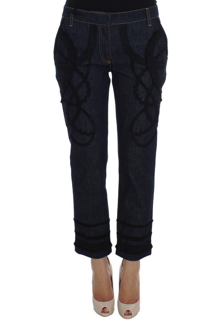 Pair of women's jeans with embroidered design on legs
