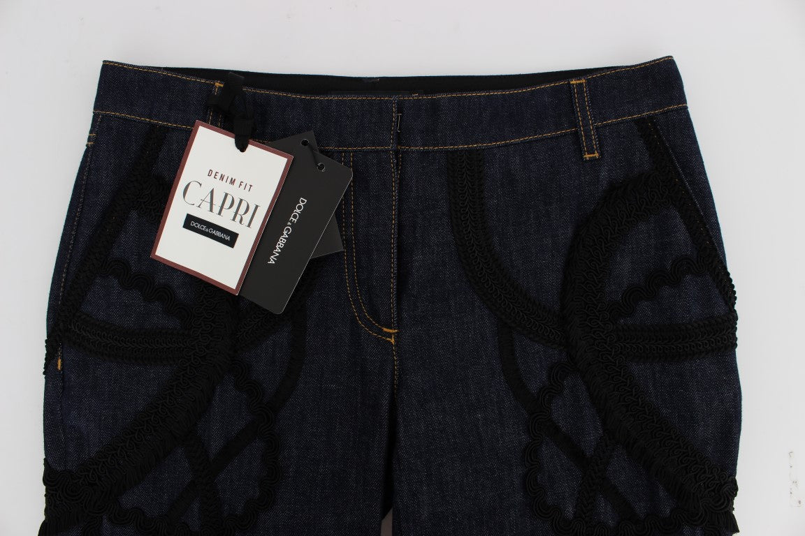 Blue denim shorts with black design on front