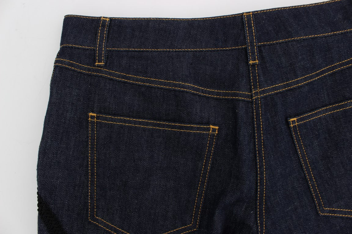 Pair of blue denim jeans with yellow stitching