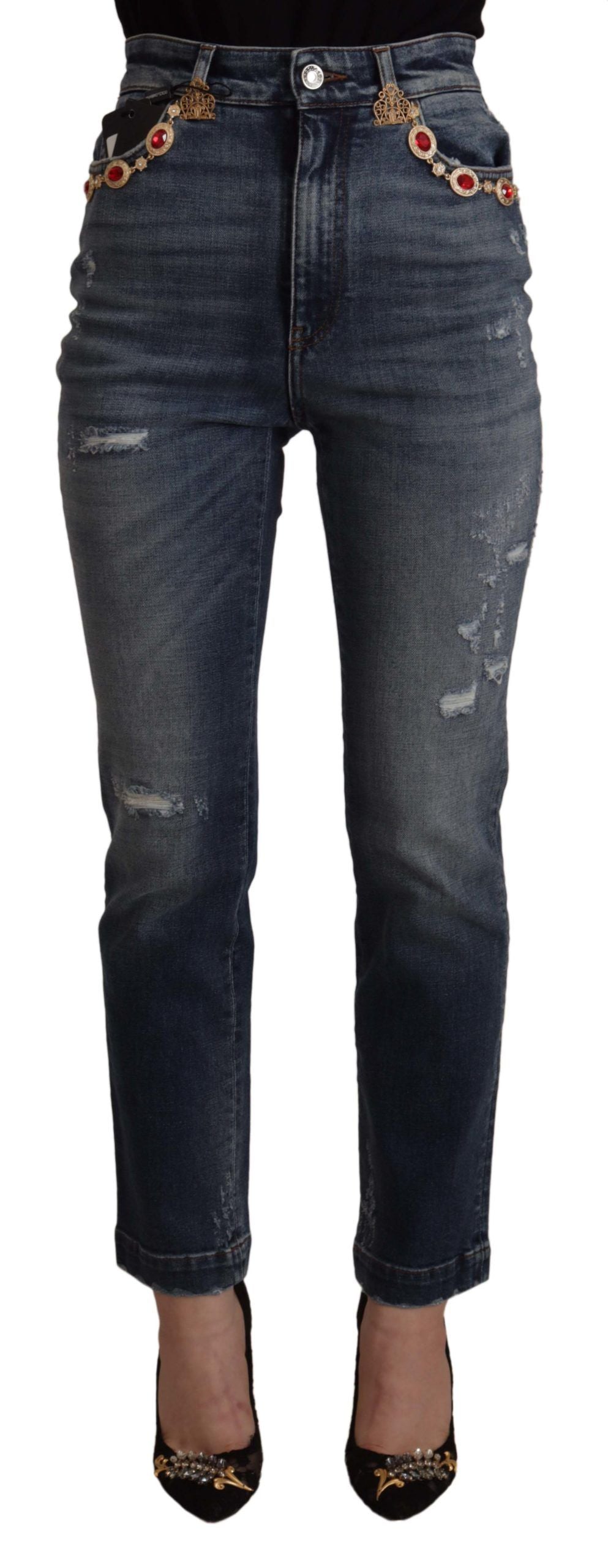 Pair of blue denim jeans with distressed details