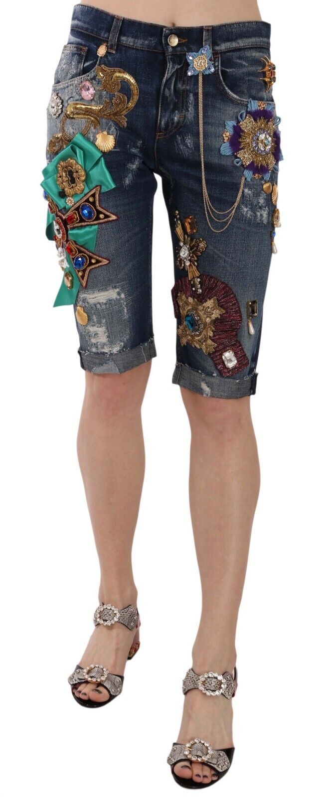 Woman wearing denim shorts with embroidery and sequins