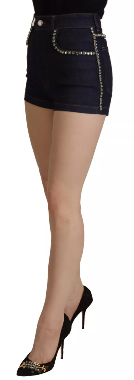 Woman wearing denim shorts and black high heels