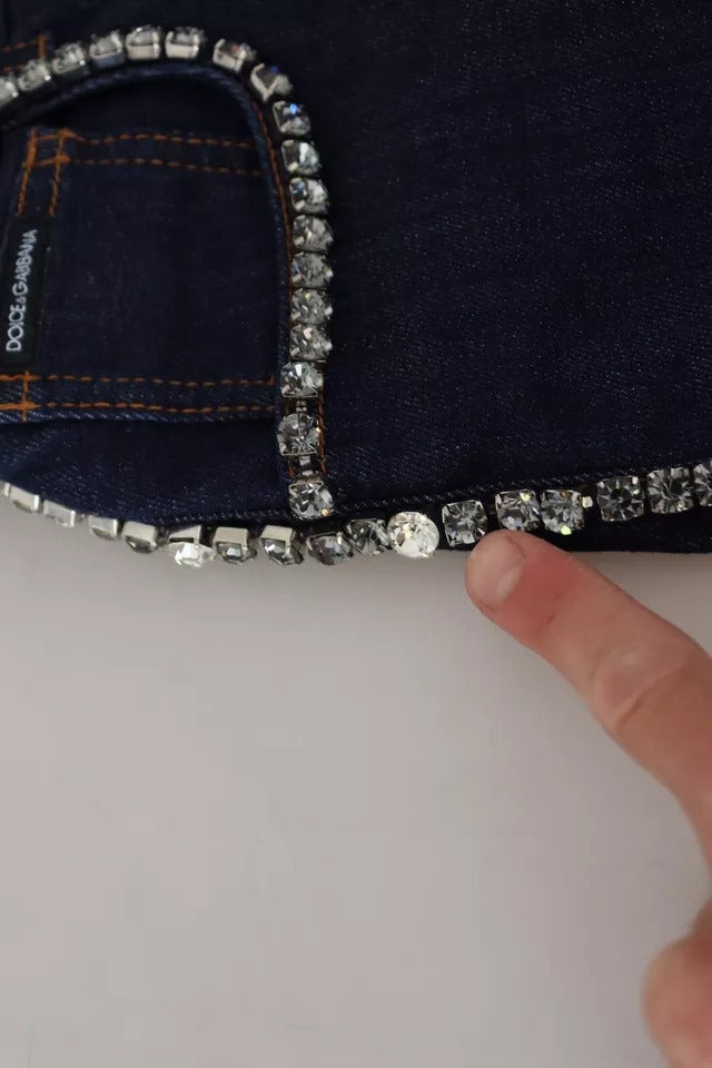 A pair of blue denim stretch crystal hot pants shorts with a glittery embellishment