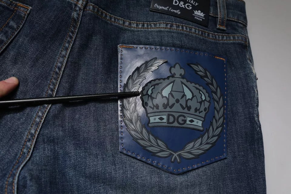 Blue jeans with embroidered crown logo on back pocket
