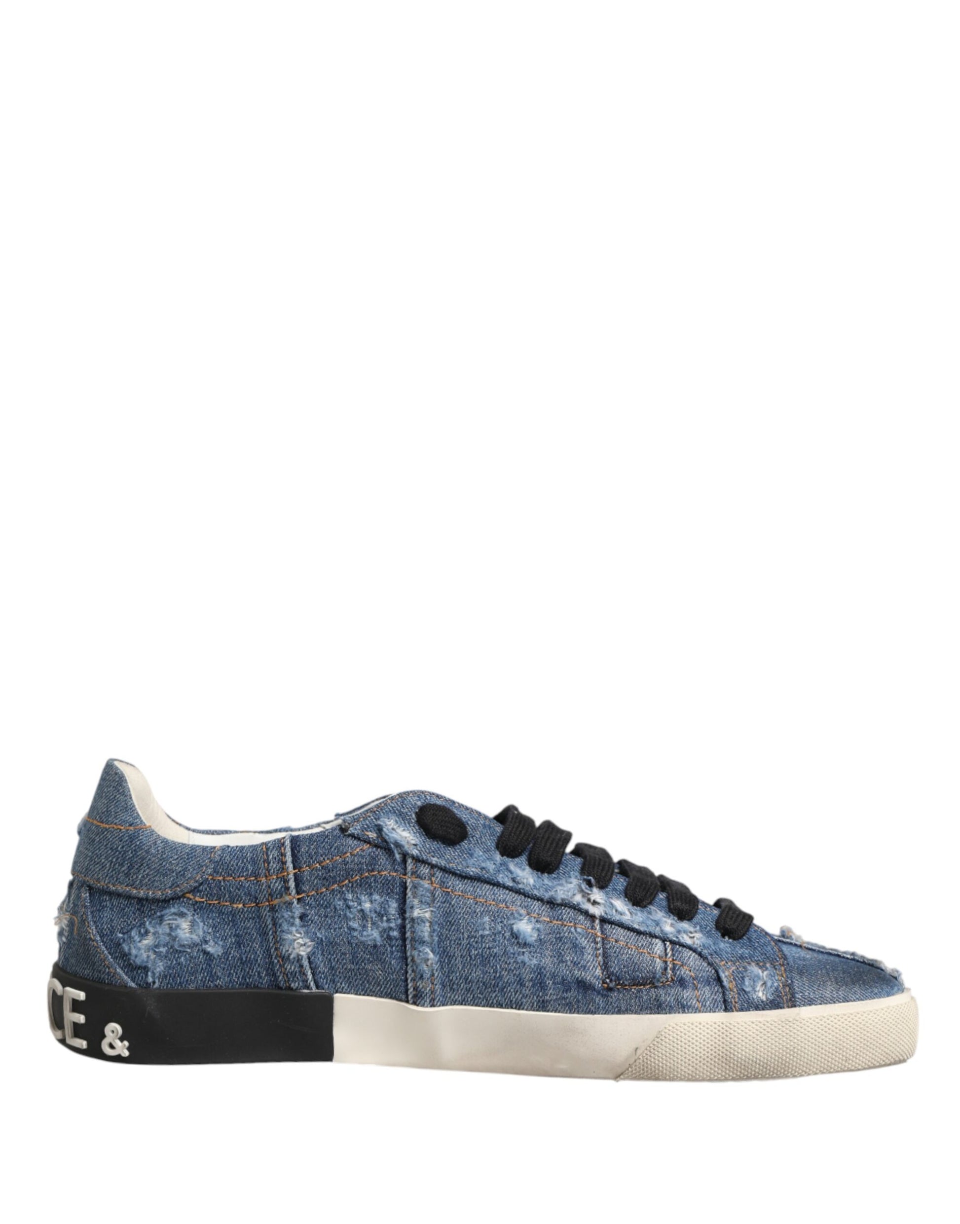 A pair of blue denim sneakers with white laces and a black stripe on the side