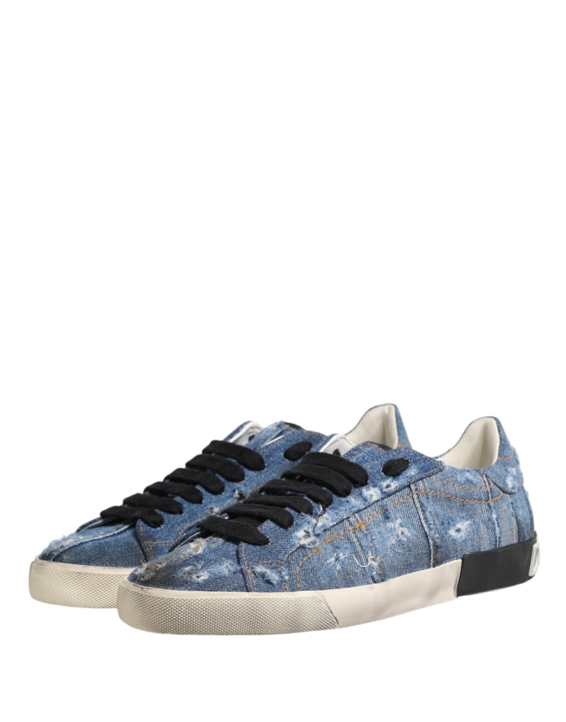 A pair of blue denim sneakers with white soles and laces, featuring a distressed design