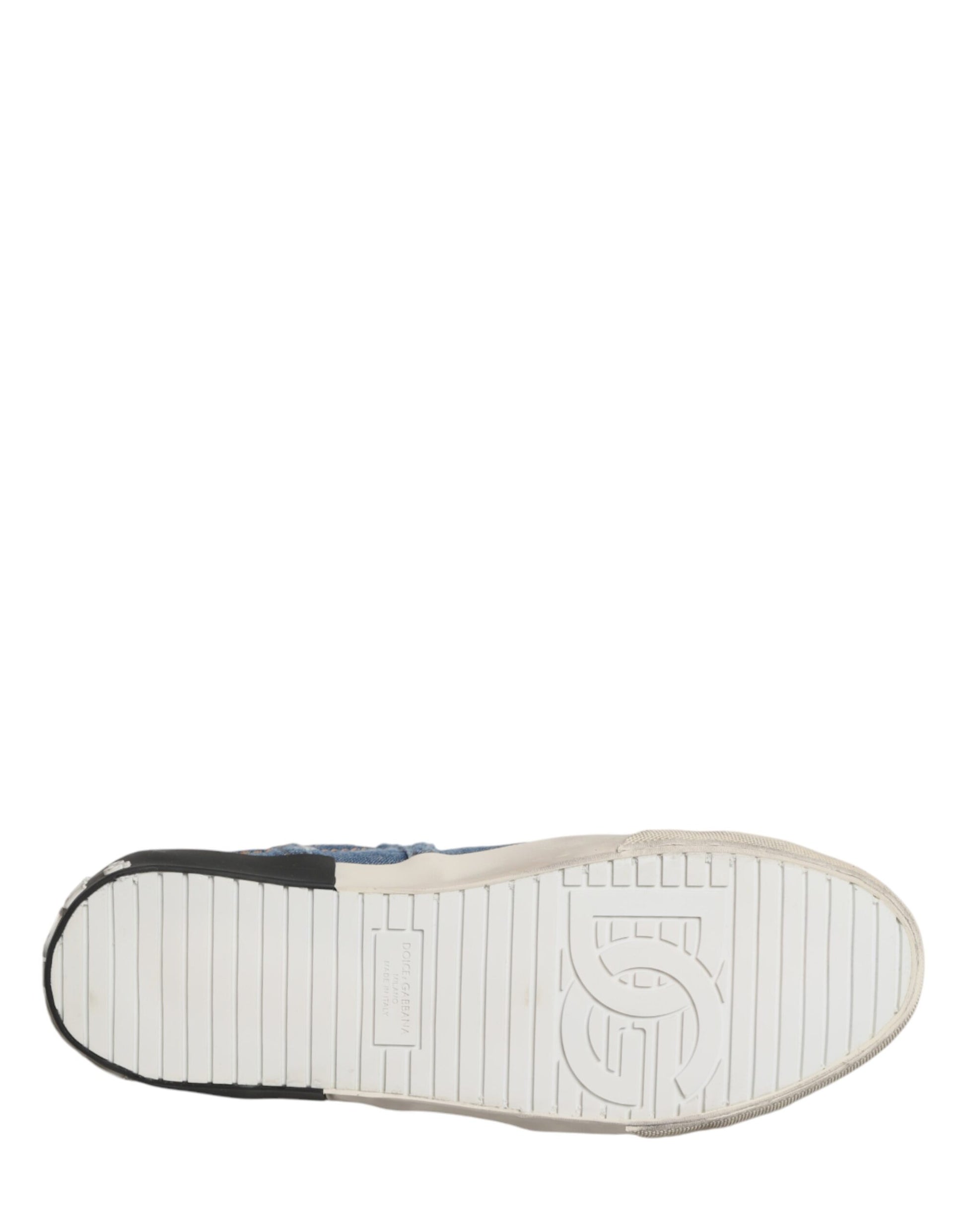 A single blue distressed denim sneaker with white sole and heel, featuring the Dolce & Gabbana logo