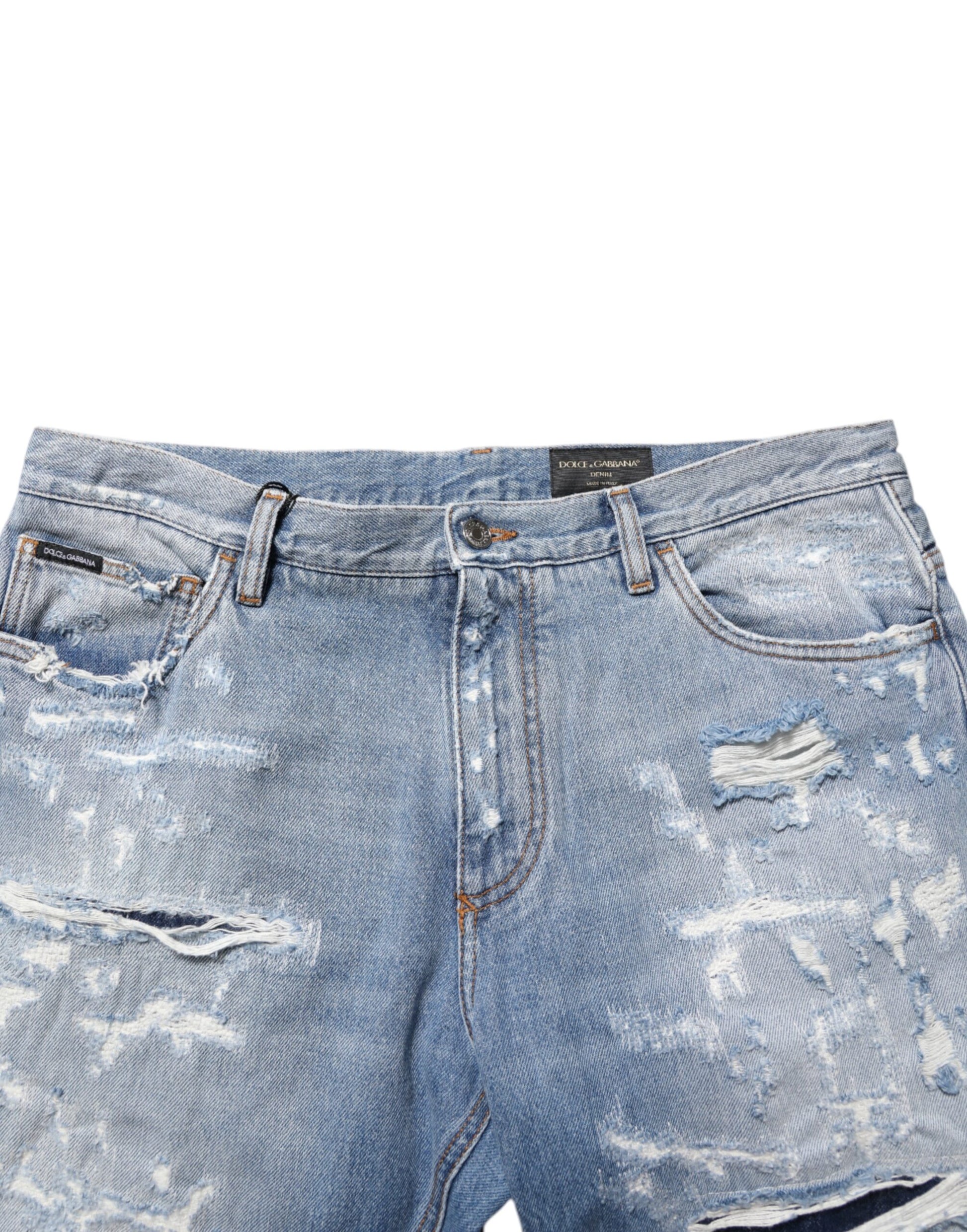 Blue denim shorts with distressed design