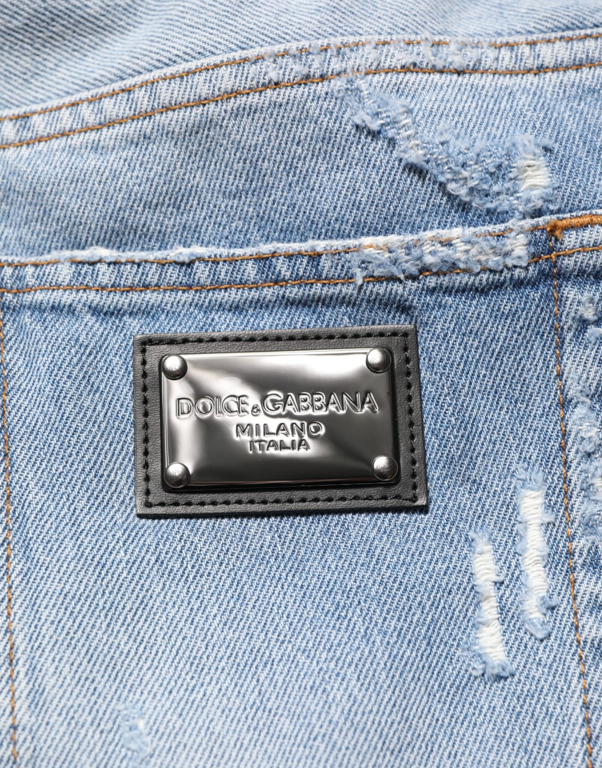 Pair of blue jeans with a black label on the back pocket