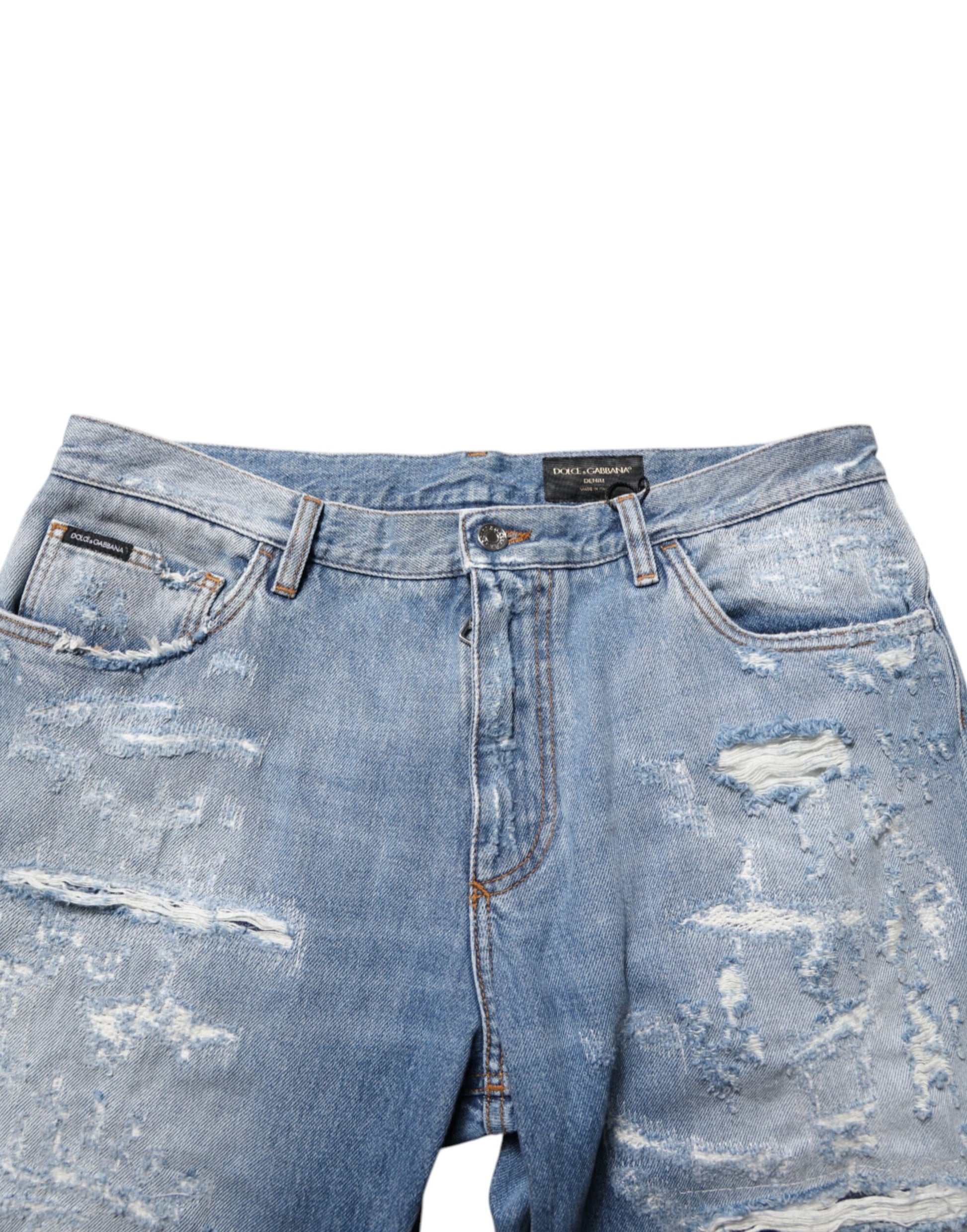 Blue denim shorts with distressed design