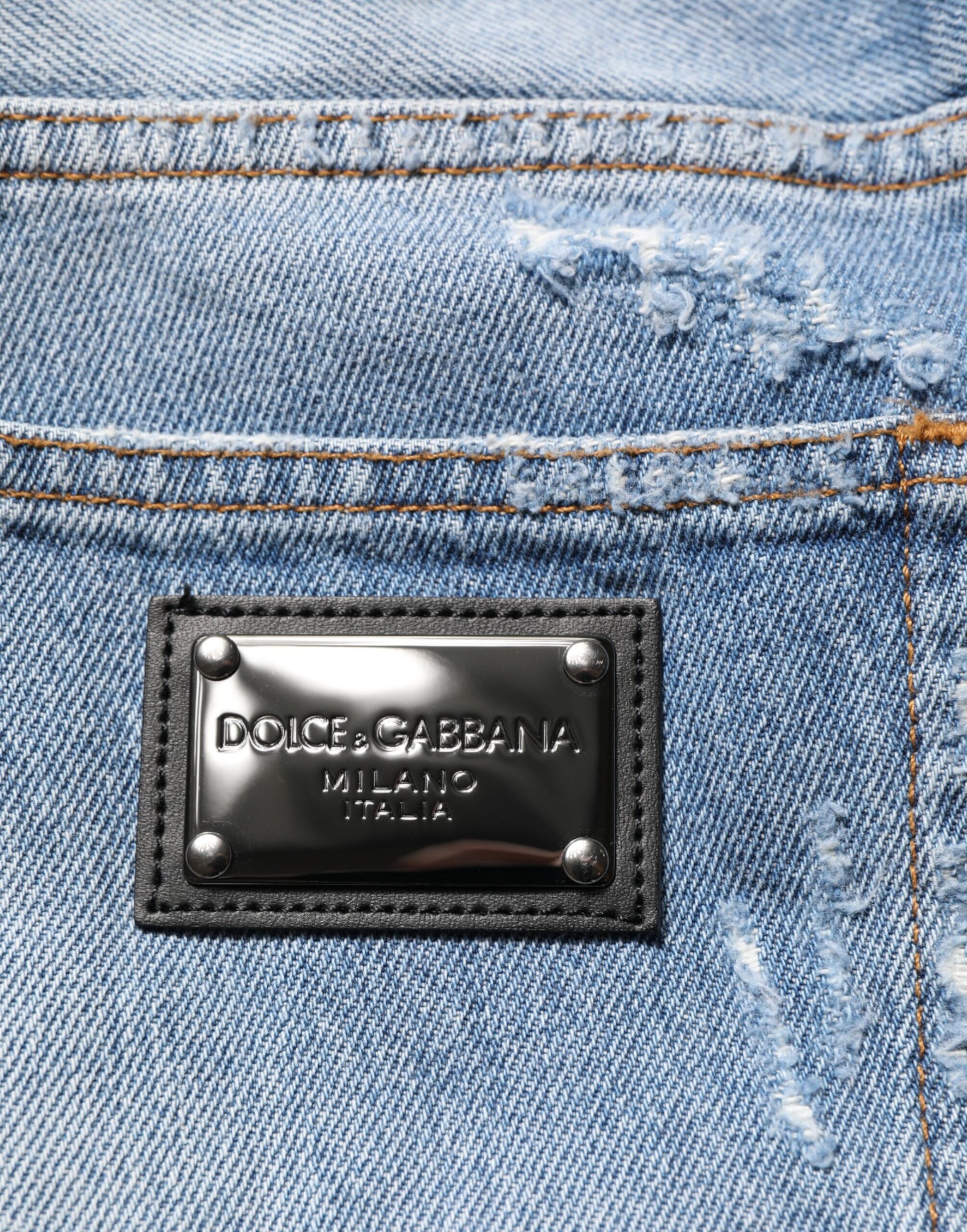 Blue jeans with black label on waistband