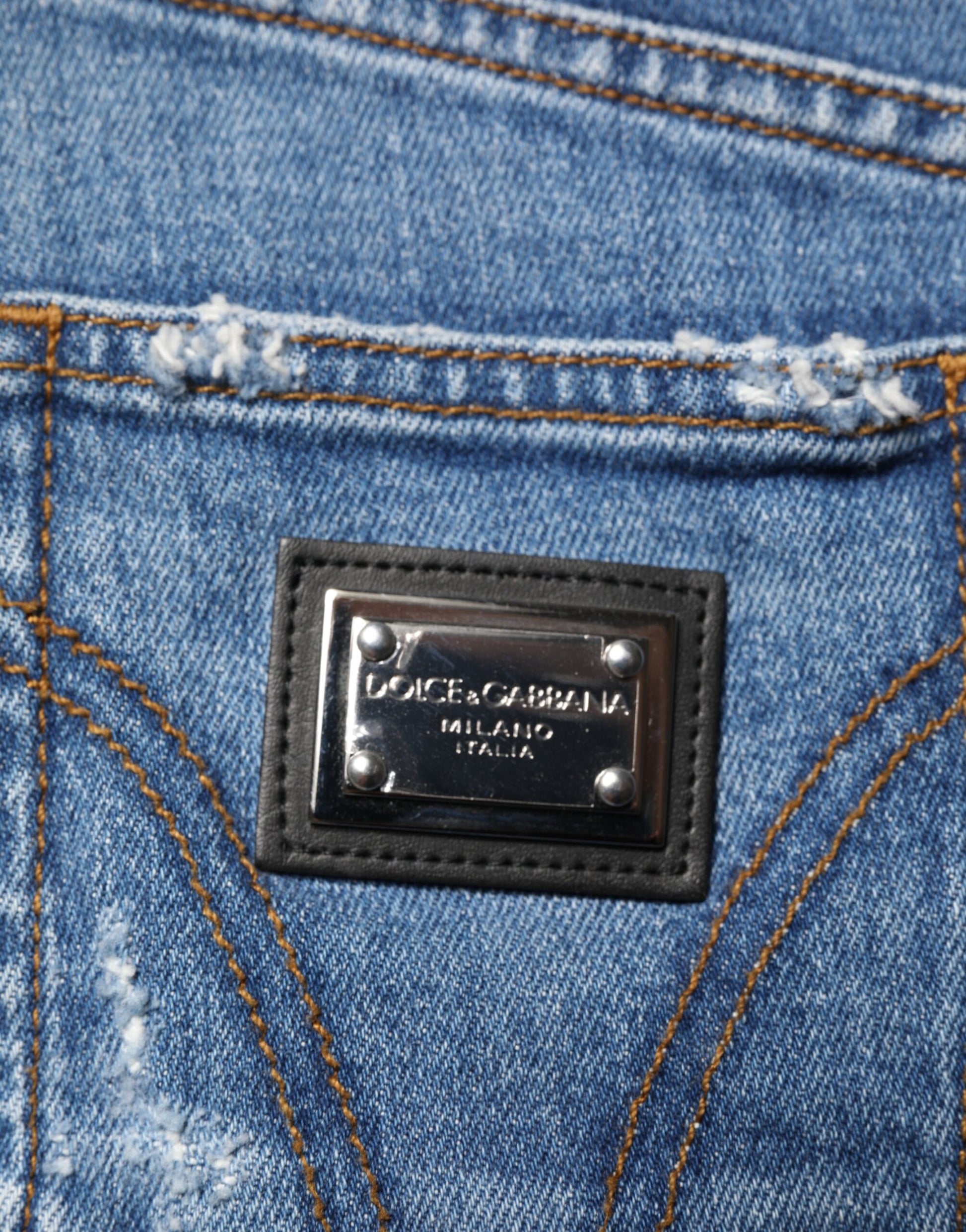Pair of blue jeans with black label on waistband