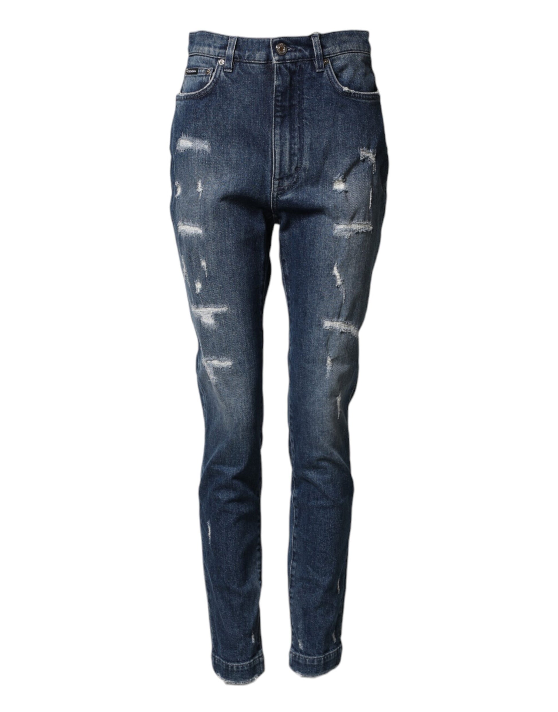 Pair of blue denim jeans with distressed areas and rips on legs