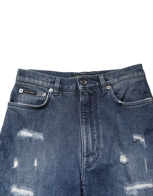Blue denim shorts with distressed details