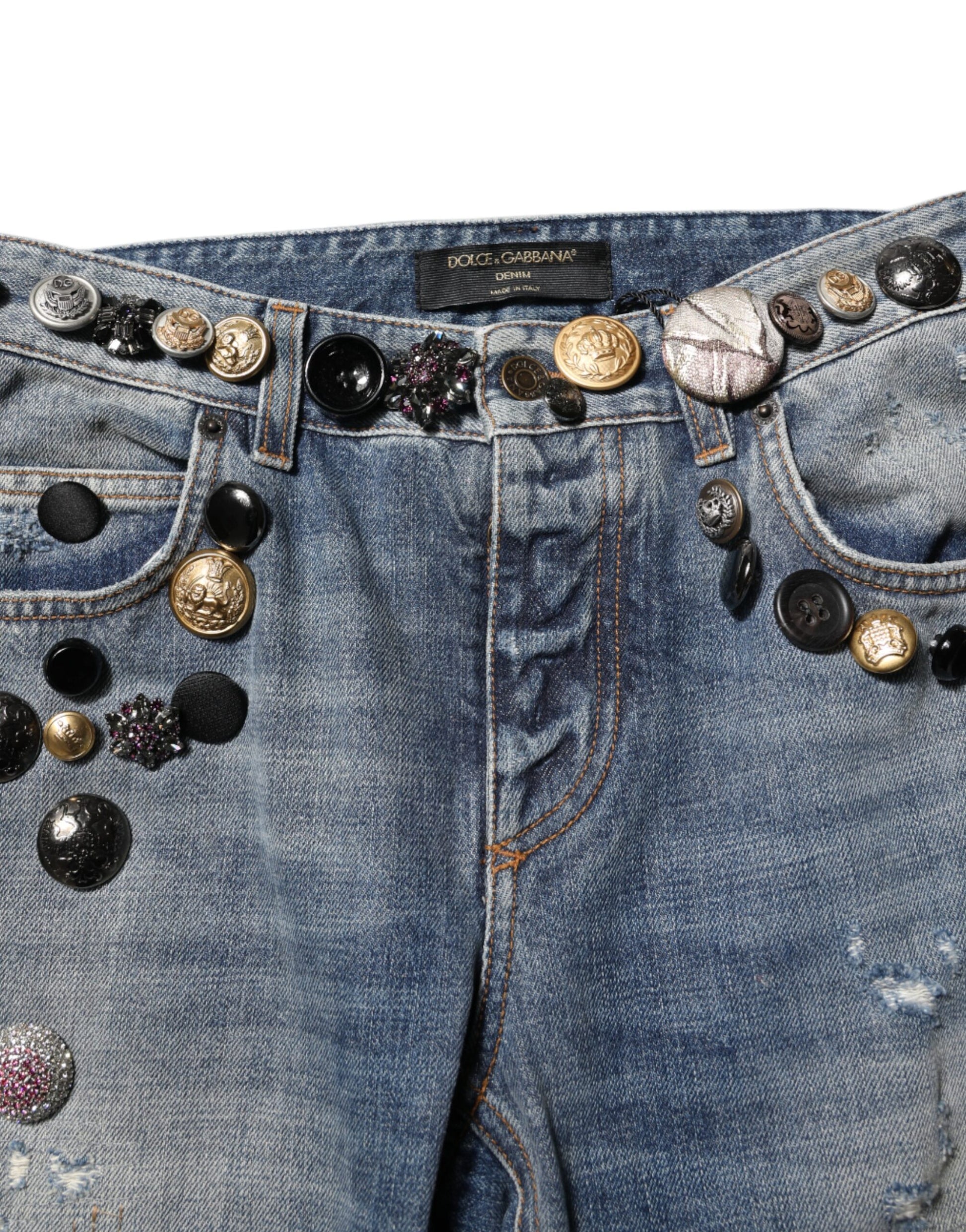 Denim jeans with embellishments on waistband