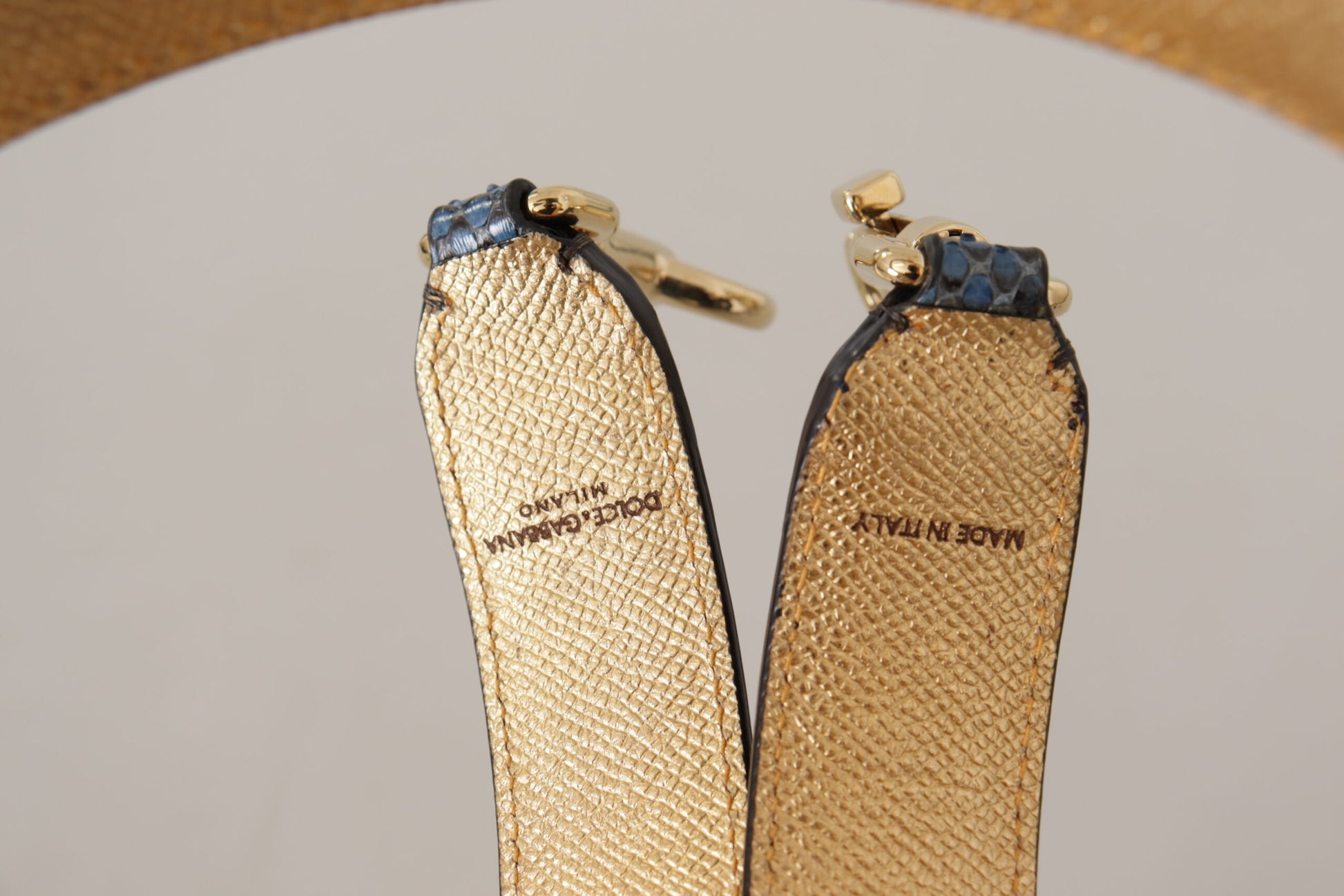 Gold cufflinks with blue stones