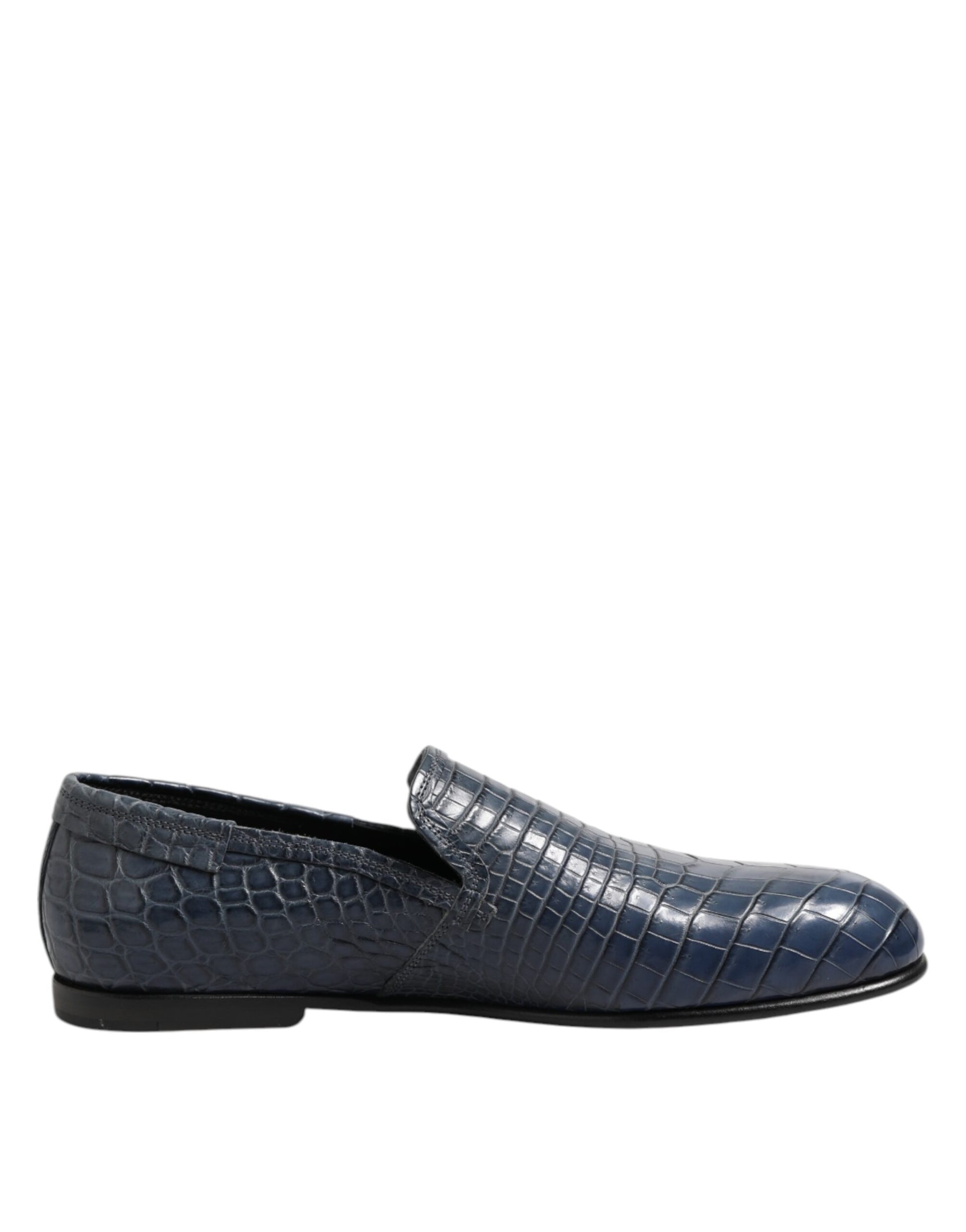 A pair of blue exotic leather slip on loafers for men