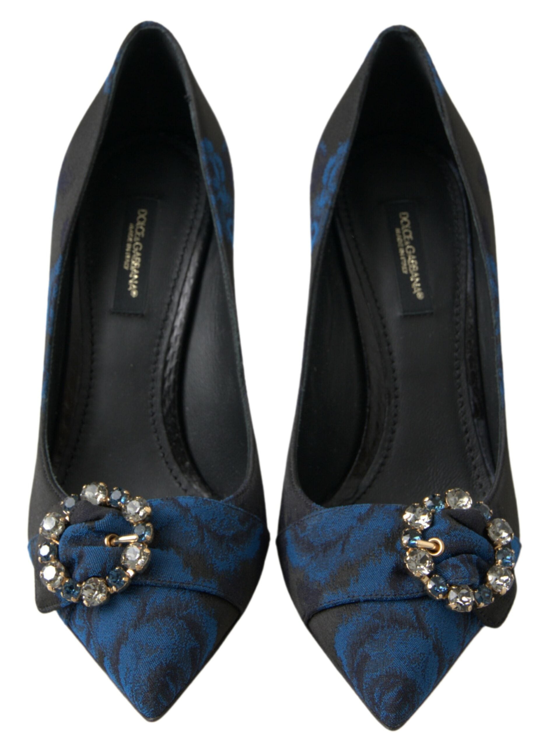 Pair of women's dress shoes with embellishments on heels