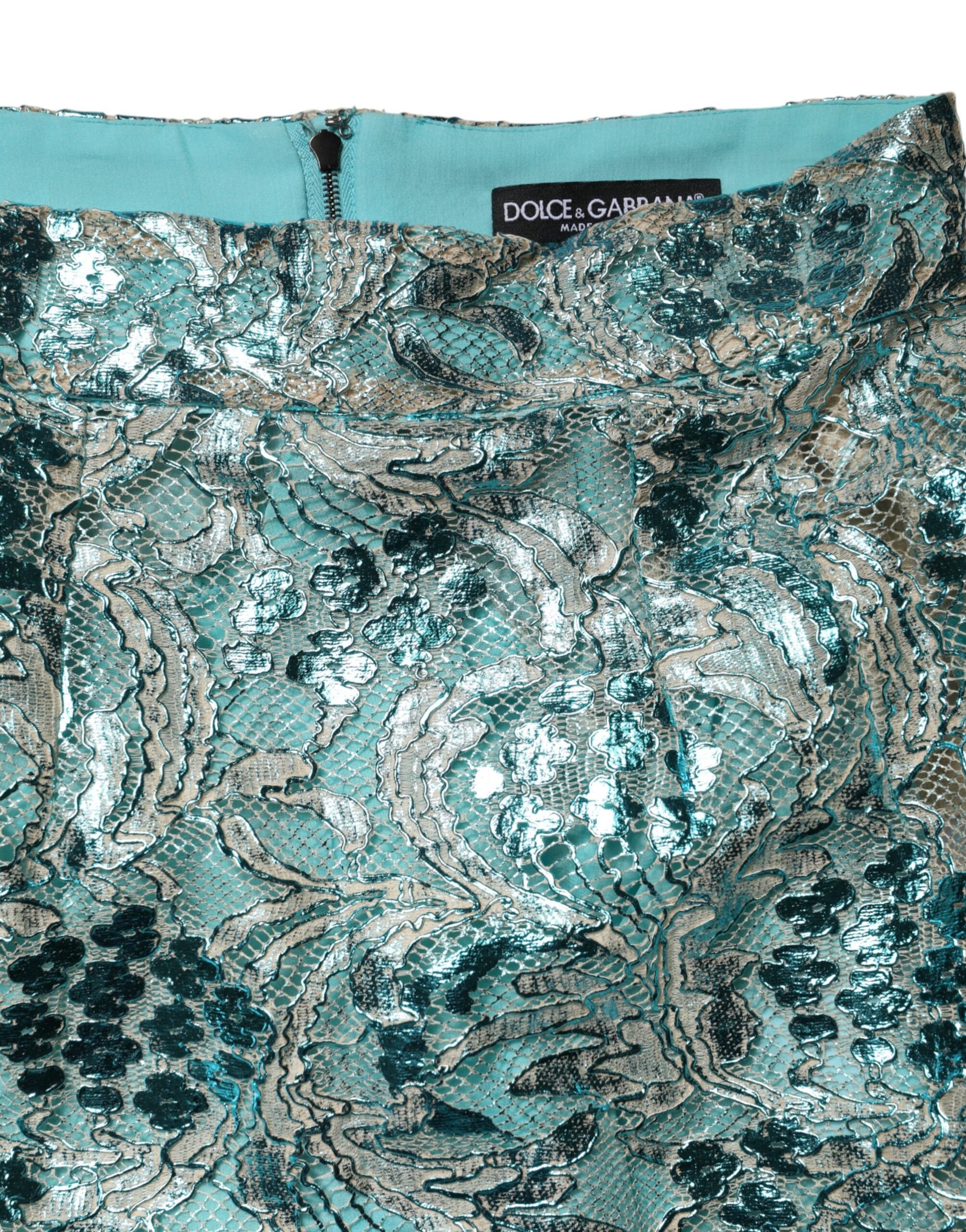 Blue sequined garment with intricate patterns