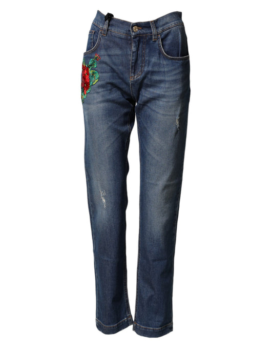 Pair of blue jeans with floral embroidery on legs