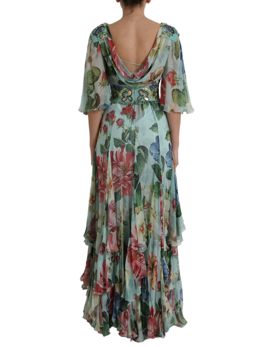 A long blue floral print dress with tiered skirt and sleeveless design