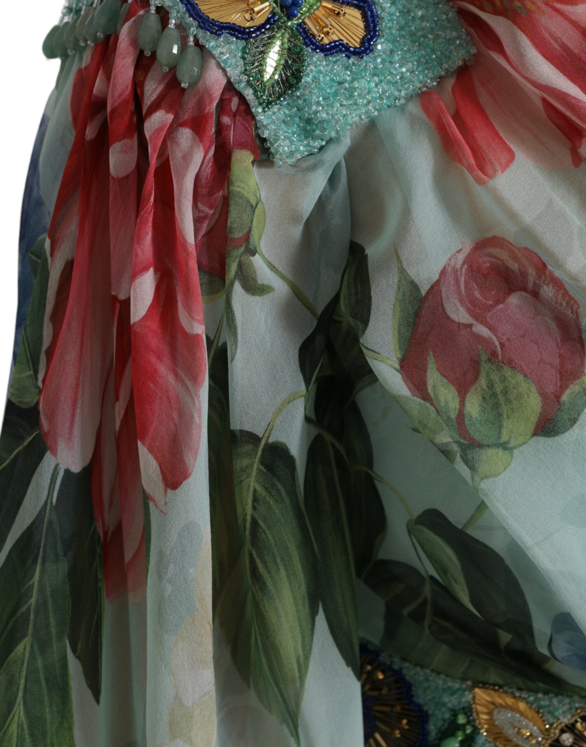 A blue floral print tiered long maxi dress with ruffles and embellishments