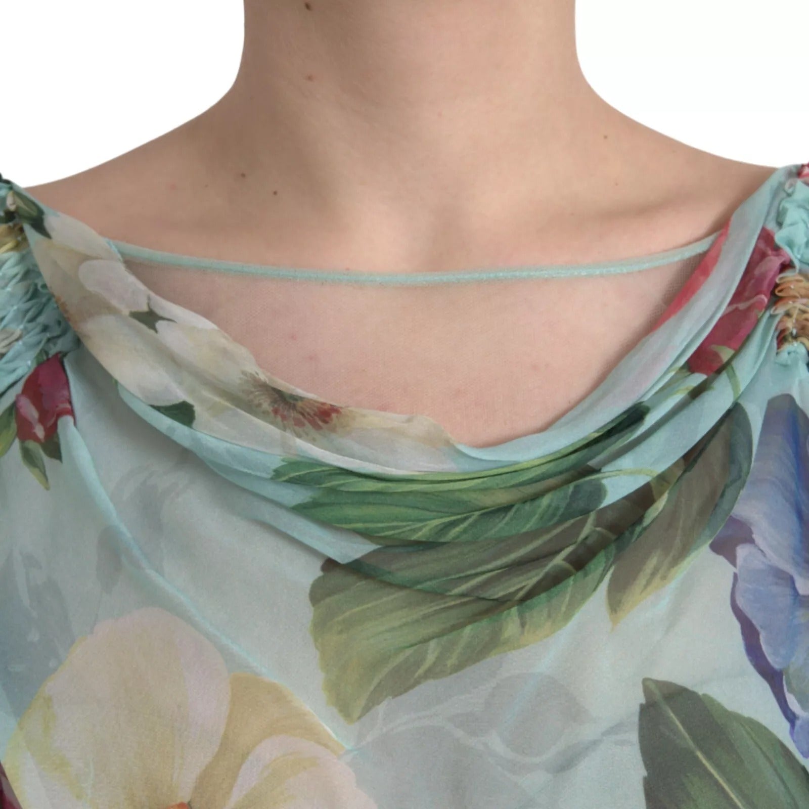 A blue floral print tiered long maxi dress with a V-neckline and ruched detailing