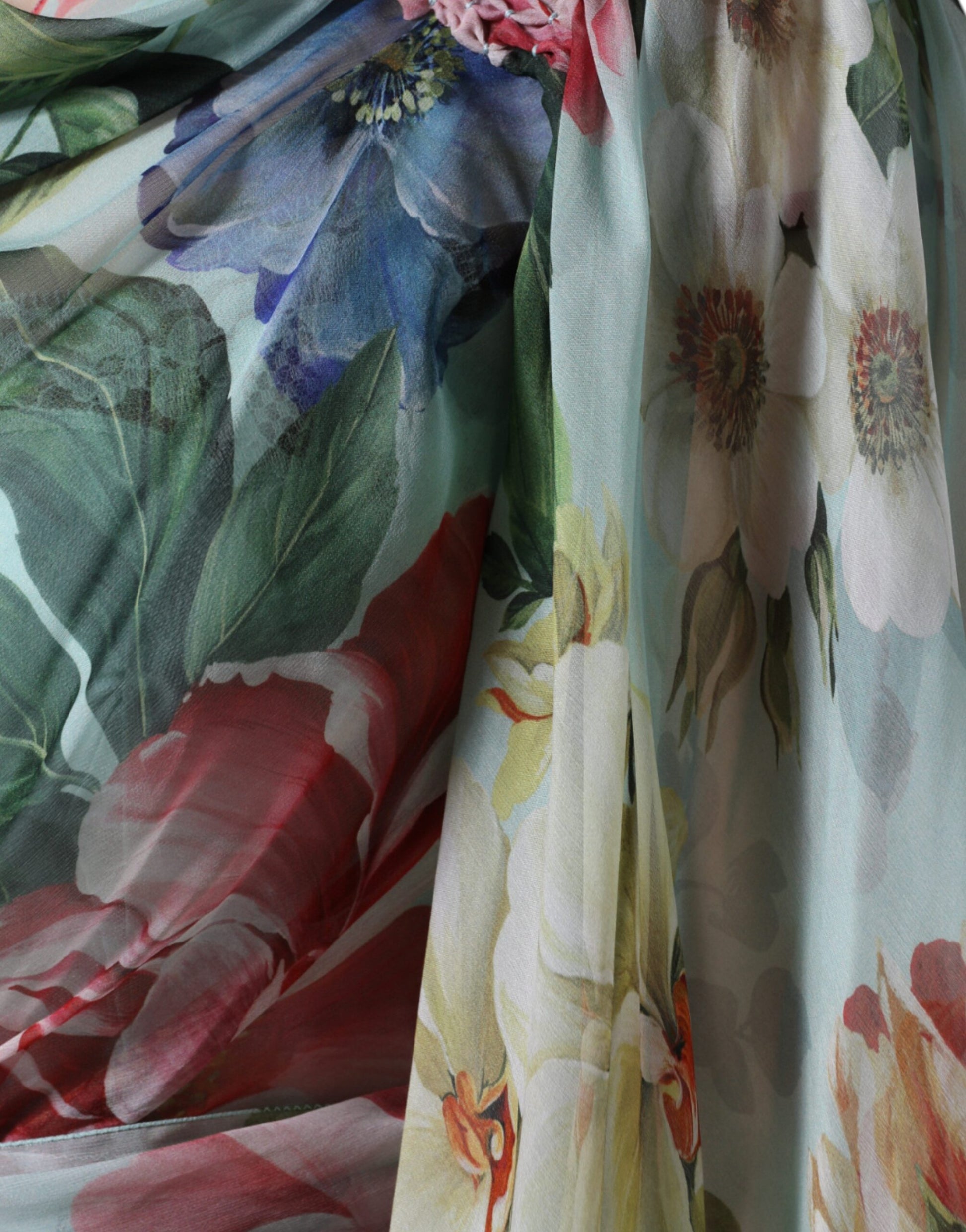 A blue floral print tiered long maxi dress