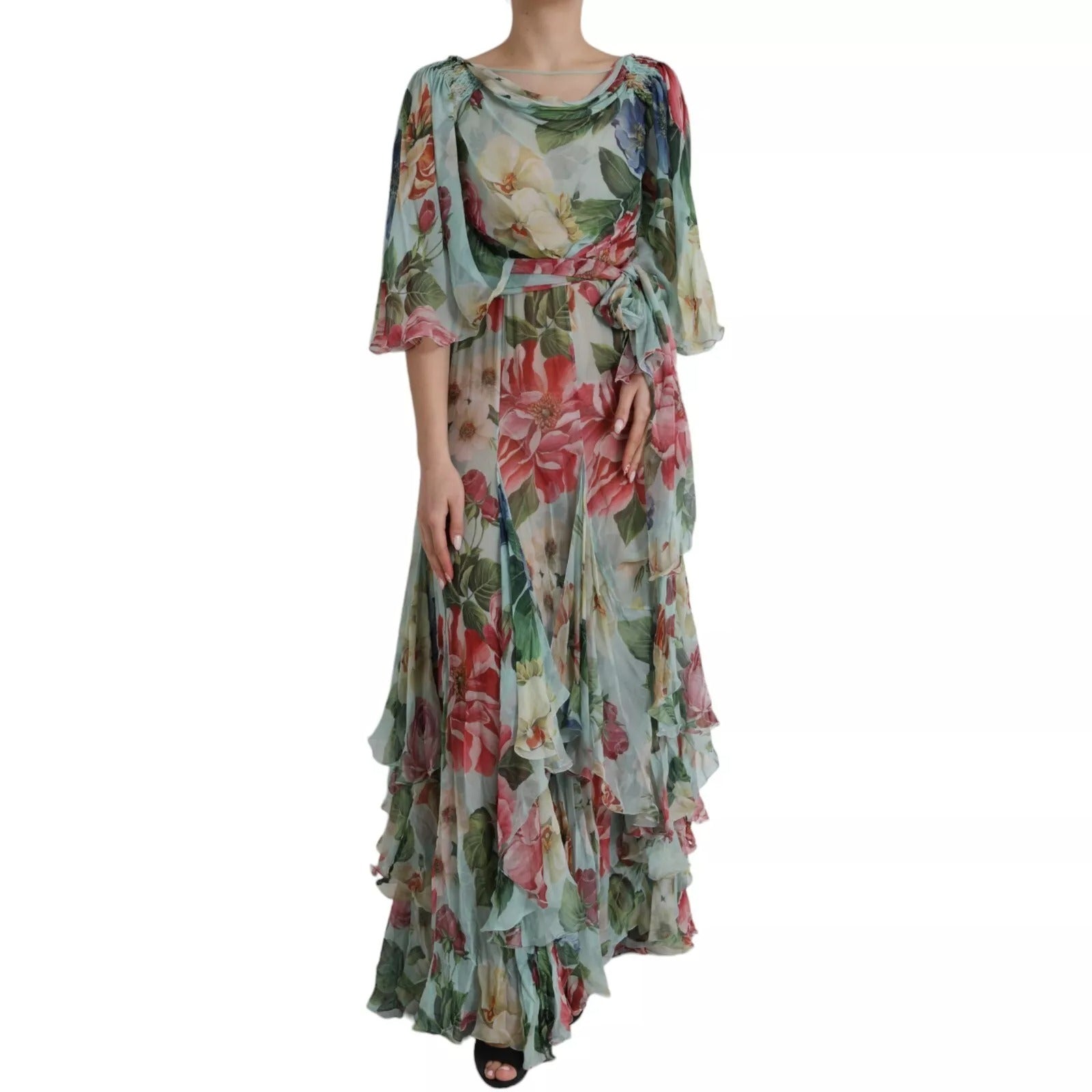 A long blue floral print dress with tiered ruffles and a wrap style