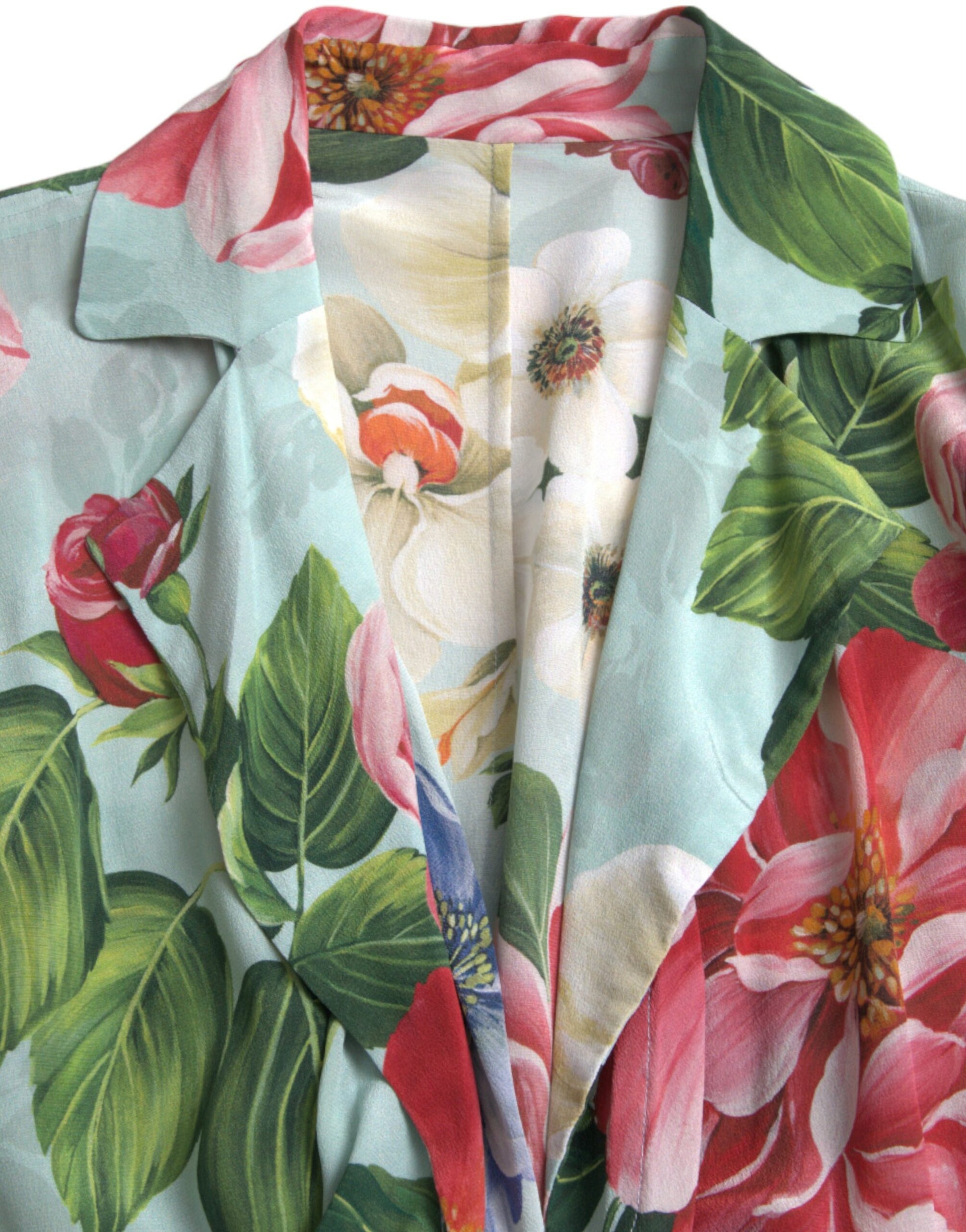 A blue floral wide leg jumpsuit dress with a wrap style and long sleeves
