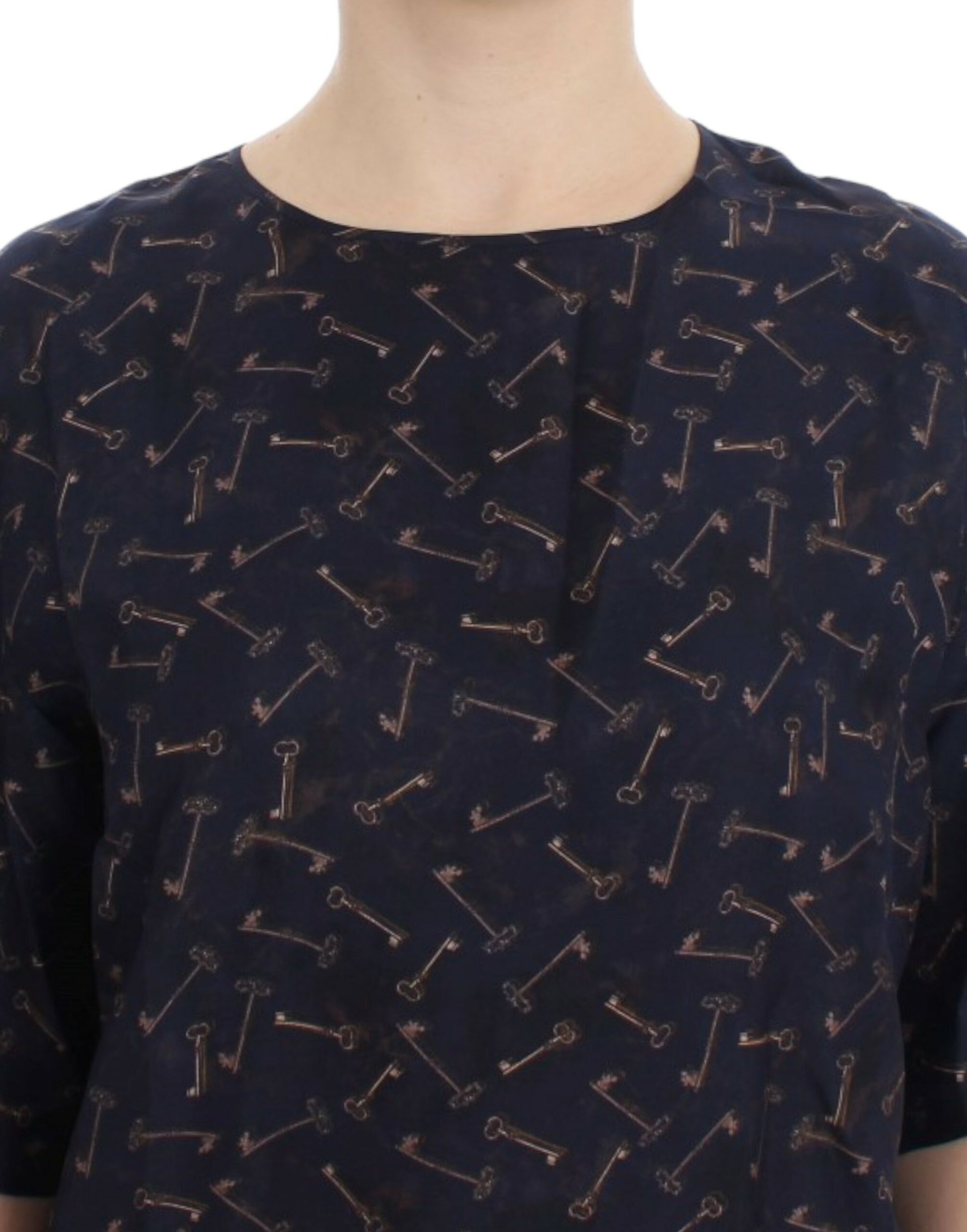 Blue shirt with key pattern